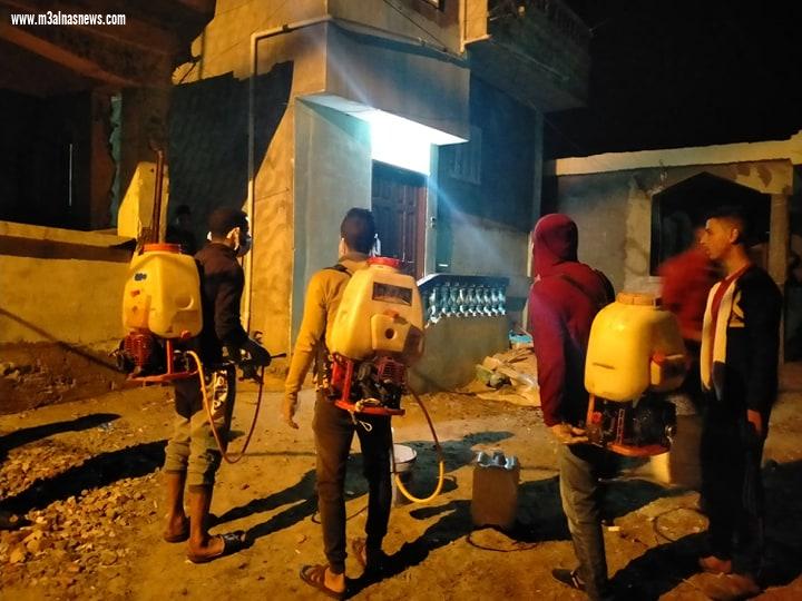 بالجهود الذاتية.. شباب قرية عمران بكفرالشيخ يشاركون فى تعقيم قريتهم