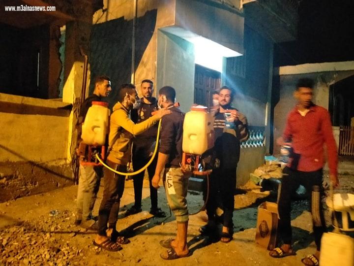 بالجهود الذاتية.. شباب قرية عمران بكفرالشيخ يشاركون فى تعقيم قريتهم