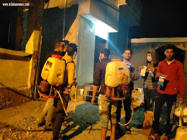 بالجهود الذاتية.. شباب قرية عمران بكفرالشيخ يشاركون فى تعقيم قريتهم