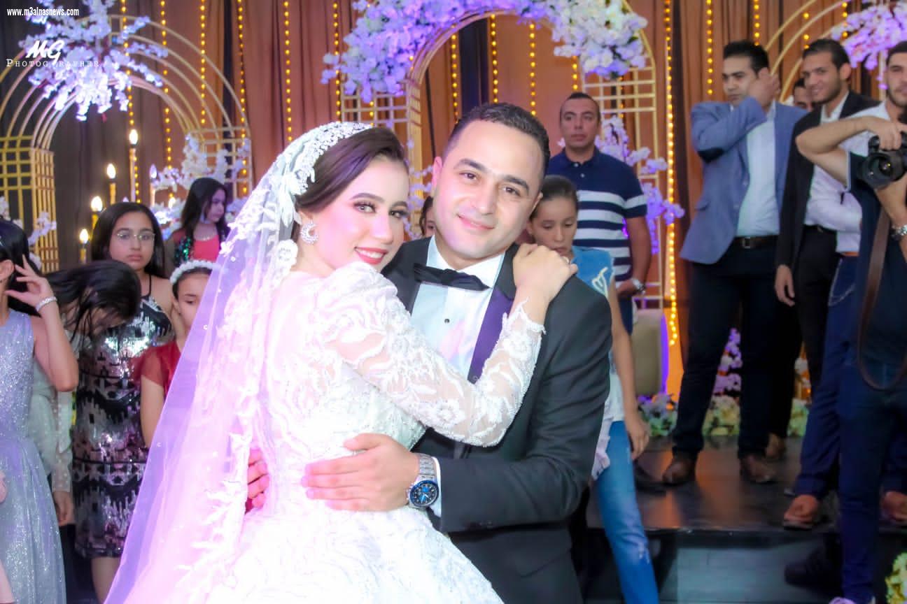 الزميل محمد عطية .. يهنىء احمد و الاء بالزواج السعيد