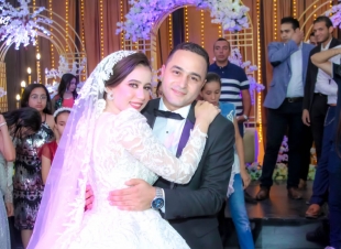 الزميل محمد عطية .. يهنىء احمد و الاء بالزواج السعيد